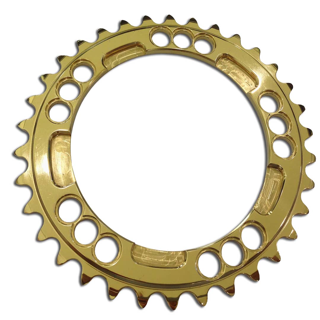 Sprocket coated in pvd titanium gold coating