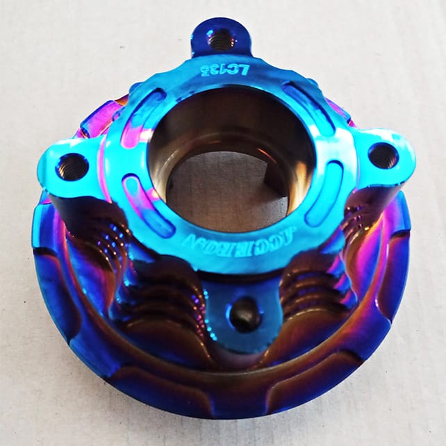 Automotive part coated in pvd rainbow coating